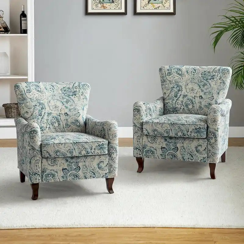 Fauteuils club rembourrés avec motif floral moderne, vendus par lot de deux.
