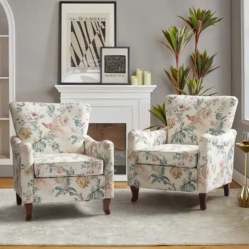 Fauteuils club rembourrés avec motif floral moderne, vendus par lot de deux.