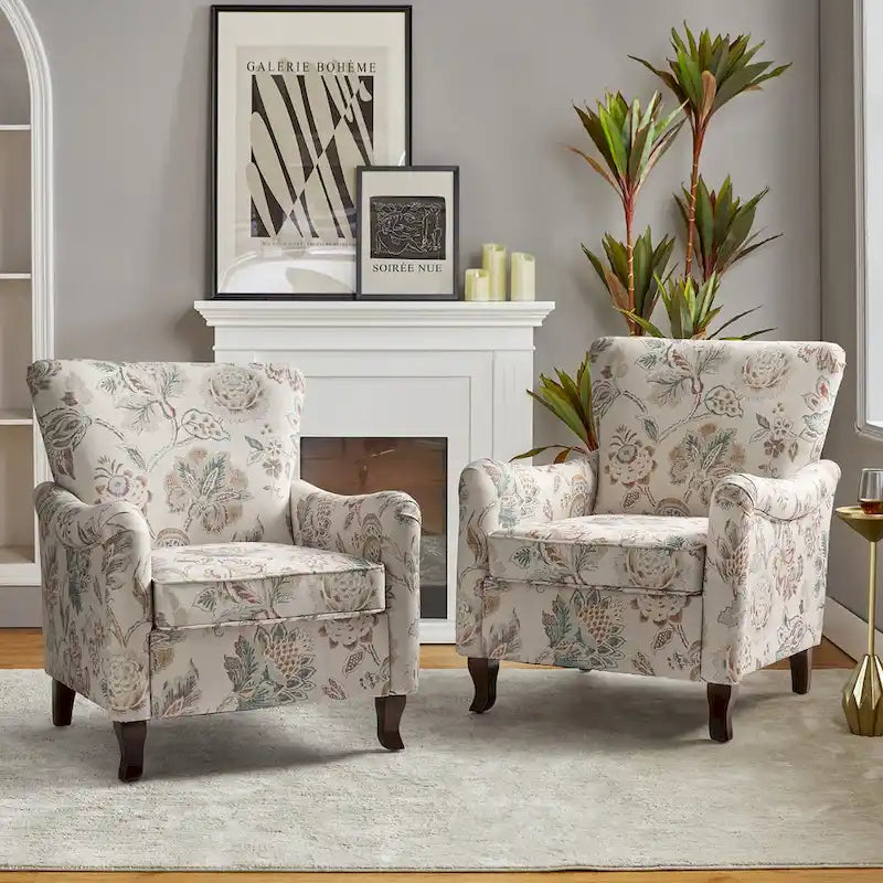 Fauteuils club rembourrés avec motif floral moderne, vendus par lot de deux.