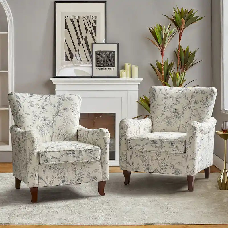 Fauteuils club rembourrés avec motif floral moderne, vendus par lot de deux.